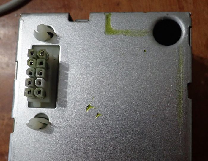 Capacitor-electrolyte-still-wet-on-power-supply.jpg