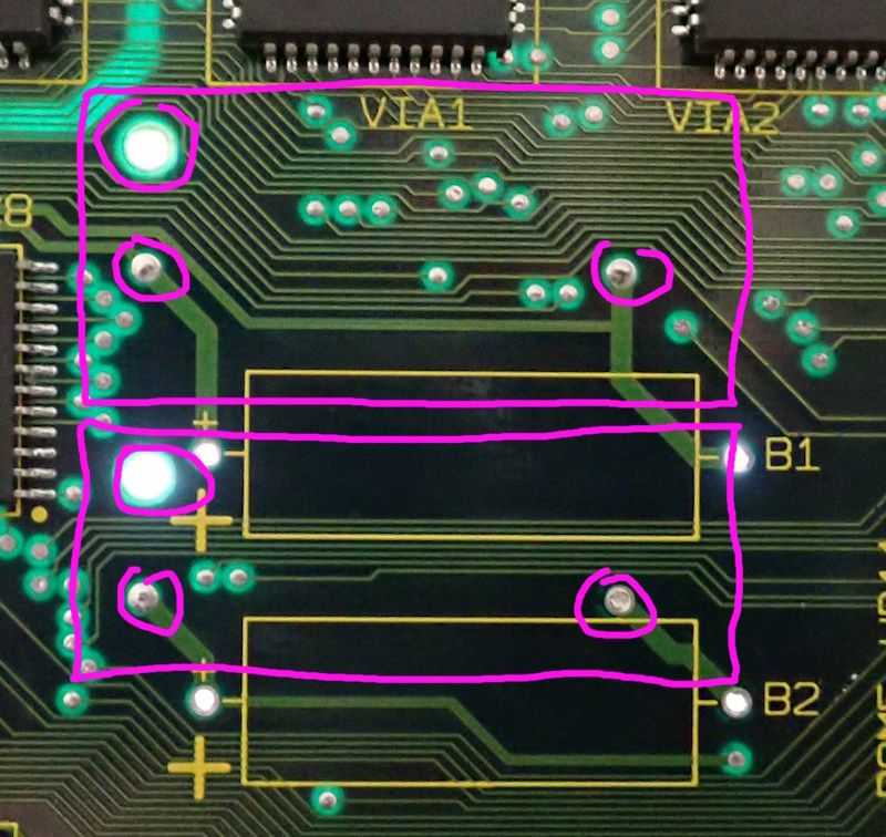 Motherboard-has-holes-for-battery-holder.jpg
